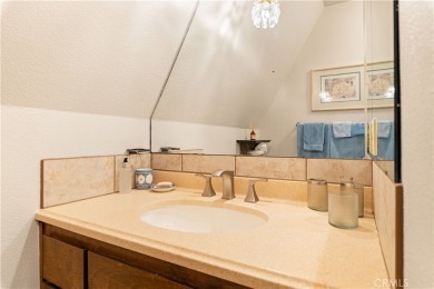 Step back in time with this iconic 1970s custom A-frame lake on Buckingham Golf and Country Club in California - for sale on GolfHomes.com, golf home, golf lot