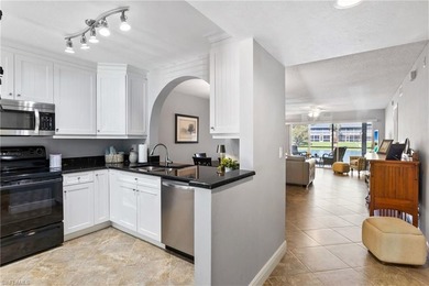 This beautifully updated lakefront residence is located in Abbey on Imperial Golf Club in Florida - for sale on GolfHomes.com, golf home, golf lot