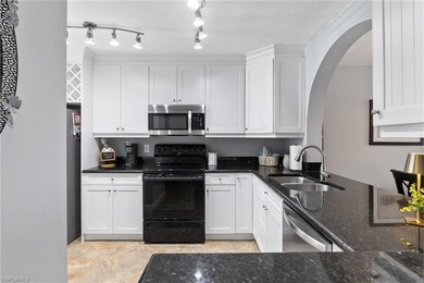 This beautifully updated lakefront residence is located in Abbey on Imperial Golf Club in Florida - for sale on GolfHomes.com, golf home, golf lot