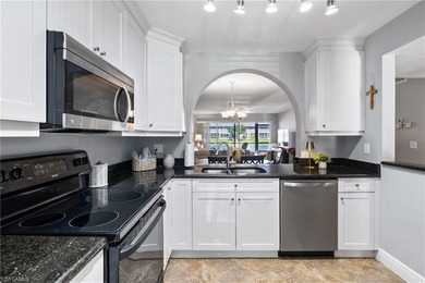 This beautifully updated lakefront residence is located in Abbey on Imperial Golf Club in Florida - for sale on GolfHomes.com, golf home, golf lot