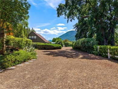 Step back in time with this iconic 1970s custom A-frame lake on Buckingham Golf and Country Club in California - for sale on GolfHomes.com, golf home, golf lot