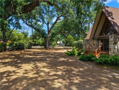 Step back in time with this iconic 1970s custom A-frame lake on Buckingham Golf and Country Club in California - for sale on GolfHomes.com, golf home, golf lot