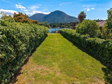 Step back in time with this iconic 1970s custom A-frame lake on Buckingham Golf and Country Club in California - for sale on GolfHomes.com, golf home, golf lot