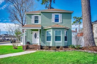 Welcome to this stunning Colonial style home nestled in a quiet on Myrtlewood Golf Course and Club  in South Carolina - for sale on GolfHomes.com, golf home, golf lot