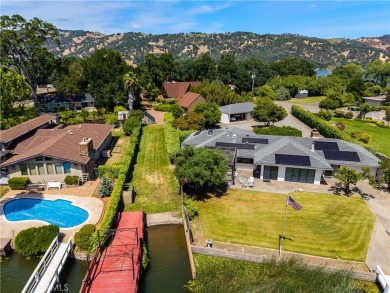 Step back in time with this iconic 1970s custom A-frame lake on Buckingham Golf and Country Club in California - for sale on GolfHomes.com, golf home, golf lot