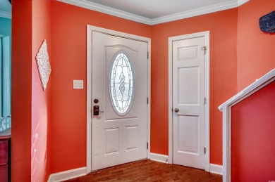 Welcome to this stunning Colonial style home nestled in a quiet on Myrtlewood Golf Course and Club  in South Carolina - for sale on GolfHomes.com, golf home, golf lot