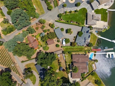 Step back in time with this iconic 1970s custom A-frame lake on Buckingham Golf and Country Club in California - for sale on GolfHomes.com, golf home, golf lot