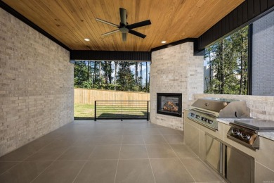 Quality construction, beautiful contemporary fixtures throughout on Chenal Country Club - Bear Den Mountain in Arkansas - for sale on GolfHomes.com, golf home, golf lot