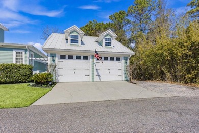 Experience the charm of a true Charleston-style home in the on Tidewater Golf Club and Plantation in South Carolina - for sale on GolfHomes.com, golf home, golf lot