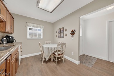 SPRAWLING TURNKEY VILLA. 55+. FABULOUS AMENITIES. Located in on Myerlee Country Club in Florida - for sale on GolfHomes.com, golf home, golf lot