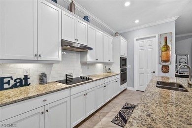 Experience resort-style living at 17200 Galway Run, a on Bonita National Golf Course in Florida - for sale on GolfHomes.com, golf home, golf lot