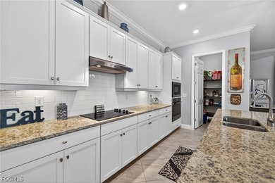 Experience resort-style living at 17200 Galway Run, a on Bonita National Golf Course in Florida - for sale on GolfHomes.com, golf home, golf lot