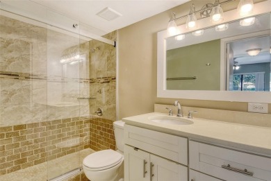 One or more photo(s) has been virtually staged. Tucked away in a on University Park Country Club in Florida - for sale on GolfHomes.com, golf home, golf lot