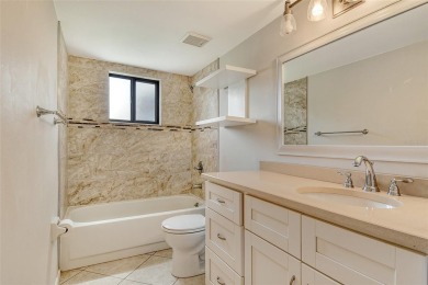 One or more photo(s) has been virtually staged. Tucked away in a on University Park Country Club in Florida - for sale on GolfHomes.com, golf home, golf lot