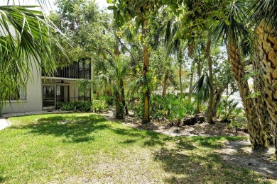 One or more photo(s) has been virtually staged. Tucked away in a on University Park Country Club in Florida - for sale on GolfHomes.com, golf home, golf lot
