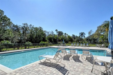 One or more photo(s) has been virtually staged. Tucked away in a on University Park Country Club in Florida - for sale on GolfHomes.com, golf home, golf lot
