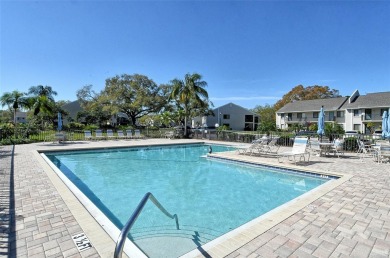 One or more photo(s) has been virtually staged. Tucked away in a on University Park Country Club in Florida - for sale on GolfHomes.com, golf home, golf lot