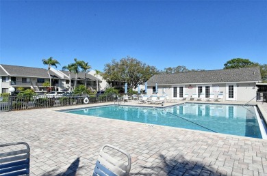 One or more photo(s) has been virtually staged. Tucked away in a on University Park Country Club in Florida - for sale on GolfHomes.com, golf home, golf lot