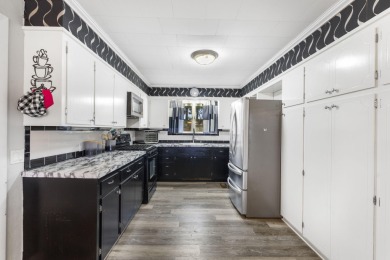 7.75-Acre Lakefront Vacation Rental + Event Space under on Lost Woods Golf Course in Missouri - for sale on GolfHomes.com, golf home, golf lot