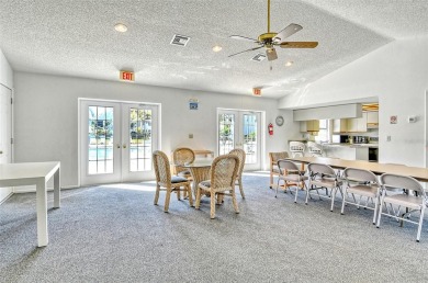 One or more photo(s) has been virtually staged. Tucked away in a on University Park Country Club in Florida - for sale on GolfHomes.com, golf home, golf lot