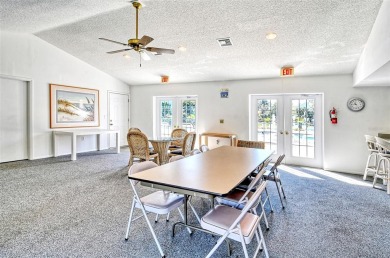 One or more photo(s) has been virtually staged. Tucked away in a on University Park Country Club in Florida - for sale on GolfHomes.com, golf home, golf lot