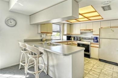 One or more photo(s) has been virtually staged. Tucked away in a on University Park Country Club in Florida - for sale on GolfHomes.com, golf home, golf lot