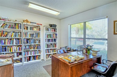 One or more photo(s) has been virtually staged. Tucked away in a on University Park Country Club in Florida - for sale on GolfHomes.com, golf home, golf lot