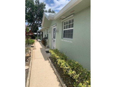 Concrete construction, gated and guarded. 2 bedrooms, 2 on Monarch Country Club in Florida - for sale on GolfHomes.com, golf home, golf lot