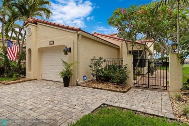 Step into effortless living in the light and bright beautifully on Deer Creek Golf Club in Florida - for sale on GolfHomes.com, golf home, golf lot