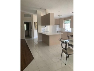 Concrete construction, gated and guarded. 2 bedrooms, 2 on Monarch Country Club in Florida - for sale on GolfHomes.com, golf home, golf lot