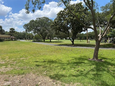 This home has all the feel of comfort with a magnificent golf on Chula Vista Executive Golf Course in Florida - for sale on GolfHomes.com, golf home, golf lot