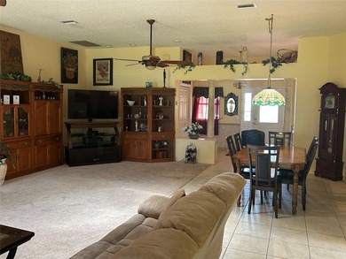 This home has all the feel of comfort with a magnificent golf on Chula Vista Executive Golf Course in Florida - for sale on GolfHomes.com, golf home, golf lot