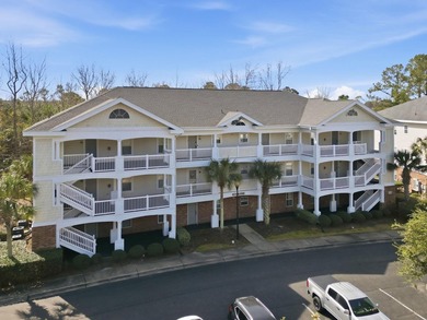 Beautiful and updated light bright third floor end unit in one on Barefoot Resort and Golf Club  in South Carolina - for sale on GolfHomes.com, golf home, golf lot