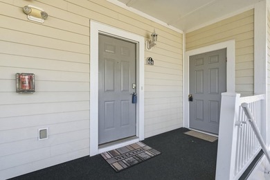 Beautiful and updated light bright third floor end unit in one on Barefoot Resort and Golf Club  in South Carolina - for sale on GolfHomes.com, golf home, golf lot