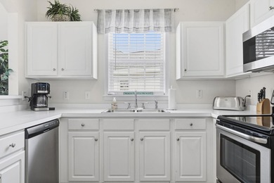 Beautiful and updated light bright third floor end unit in one on Barefoot Resort and Golf Club  in South Carolina - for sale on GolfHomes.com, golf home, golf lot