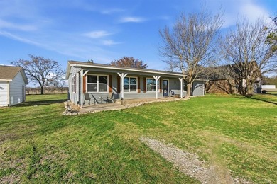 Live the Lake Kiowa lifestyle. This 3-bedroom, 2-bath home is a on Lake Kiowa Golf Course in Texas - for sale on GolfHomes.com, golf home, golf lot