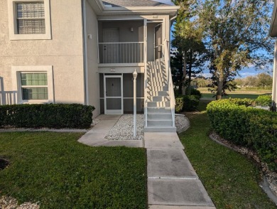 Golf course living at its finest! This charming first-floor on Deep Creek Golf Club in Florida - for sale on GolfHomes.com, golf home, golf lot