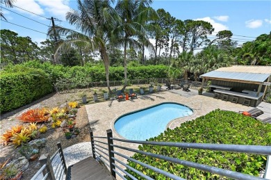 Welcome to your private tropical retreat overlooking Salt Leaf on Raptor Bay Golf Club in Florida - for sale on GolfHomes.com, golf home, golf lot