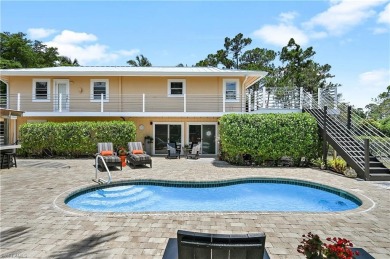 Welcome to your private tropical retreat overlooking Salt Leaf on Raptor Bay Golf Club in Florida - for sale on GolfHomes.com, golf home, golf lot