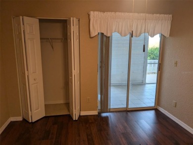 Golf course living at its finest! This charming first-floor on Deep Creek Golf Club in Florida - for sale on GolfHomes.com, golf home, golf lot