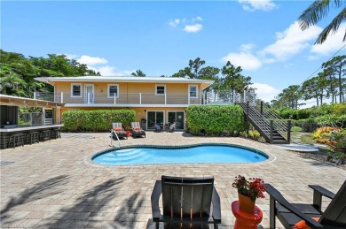 Welcome to your private tropical retreat overlooking Salt Leaf on Raptor Bay Golf Club in Florida - for sale on GolfHomes.com, golf home, golf lot