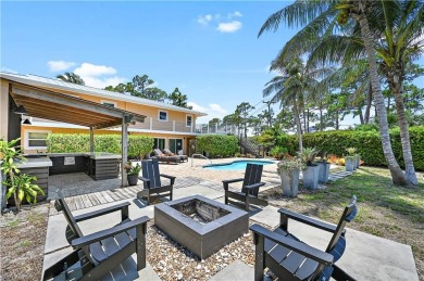 Welcome to your private tropical retreat overlooking Salt Leaf on Raptor Bay Golf Club in Florida - for sale on GolfHomes.com, golf home, golf lot