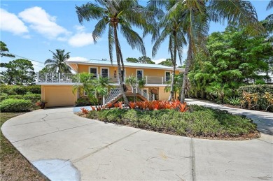 Welcome to your private tropical retreat overlooking Salt Leaf on Raptor Bay Golf Club in Florida - for sale on GolfHomes.com, golf home, golf lot