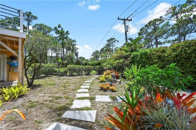 Welcome to your private tropical retreat overlooking Salt Leaf on Raptor Bay Golf Club in Florida - for sale on GolfHomes.com, golf home, golf lot