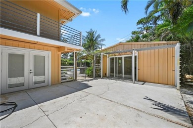 Welcome to your private tropical retreat overlooking Salt Leaf on Raptor Bay Golf Club in Florida - for sale on GolfHomes.com, golf home, golf lot