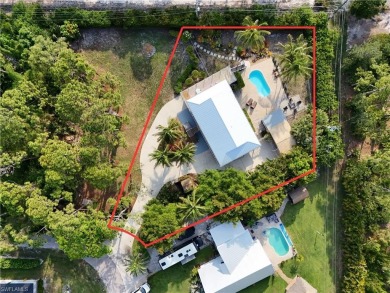 Welcome to your private tropical retreat overlooking Salt Leaf on Raptor Bay Golf Club in Florida - for sale on GolfHomes.com, golf home, golf lot