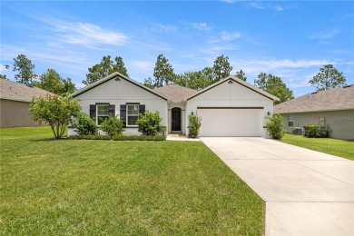 Stunning 4-bedroom, 2-bath split floor plan home in gated Lake on Lake Diamond Golf and Country Club in Florida - for sale on GolfHomes.com, golf home, golf lot