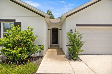 Stunning 4-bedroom, 2-bath split floor plan home in gated Lake on Lake Diamond Golf and Country Club in Florida - for sale on GolfHomes.com, golf home, golf lot