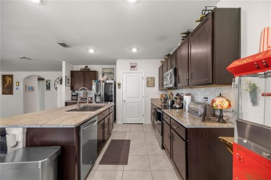 Stunning 4-bedroom, 2-bath split floor plan home in gated Lake on Lake Diamond Golf and Country Club in Florida - for sale on GolfHomes.com, golf home, golf lot
