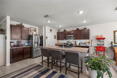 Stunning 4-bedroom, 2-bath split floor plan home in gated Lake on Lake Diamond Golf and Country Club in Florida - for sale on GolfHomes.com, golf home, golf lot